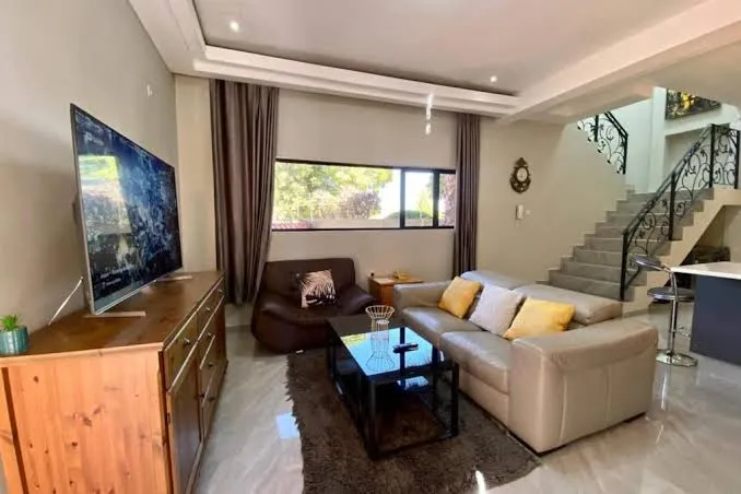 modern, two-story luxury house - Two-Bedroom Apartment, Gaborone exterior view