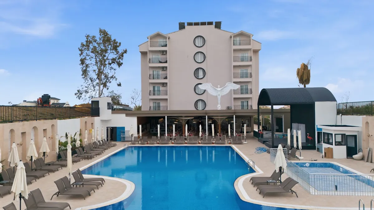 Q Ella Beach Hotel Side, Side exterior view